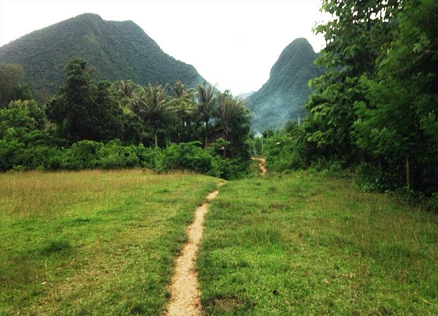 Arrival in a village after 2 hour trekking the jungle