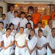 Family picture during a cremation ceremony in Luang Prabang